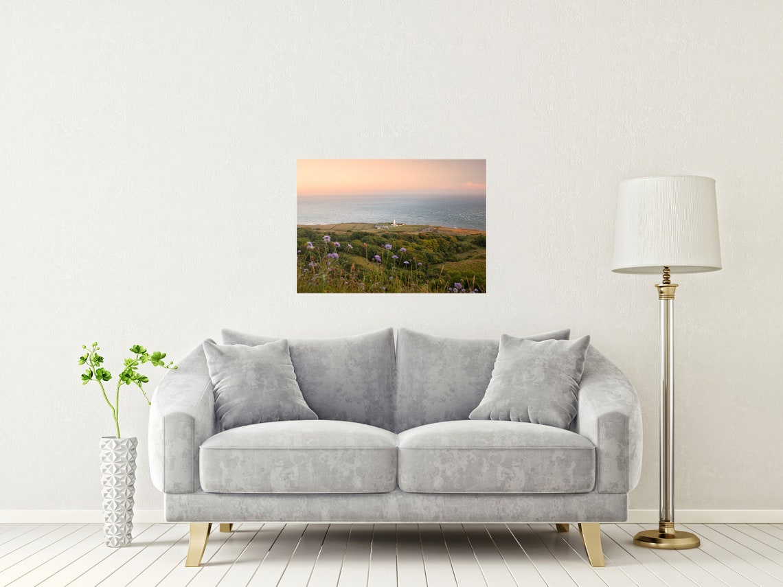 White Lighthouse on Coastal Cliffs with Wildflower Meadow Poster - Image 2