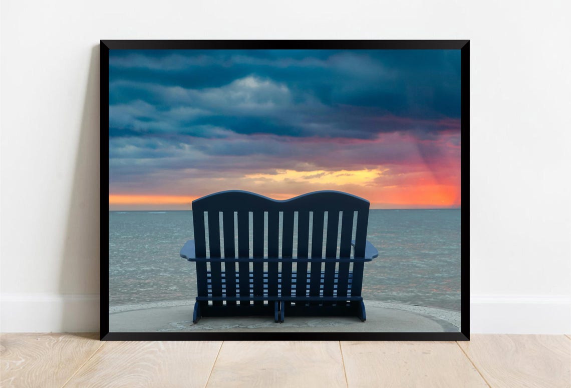 Blue Double Beach Chair Facing the Ocean at Golden Sunset Poster - Image 2