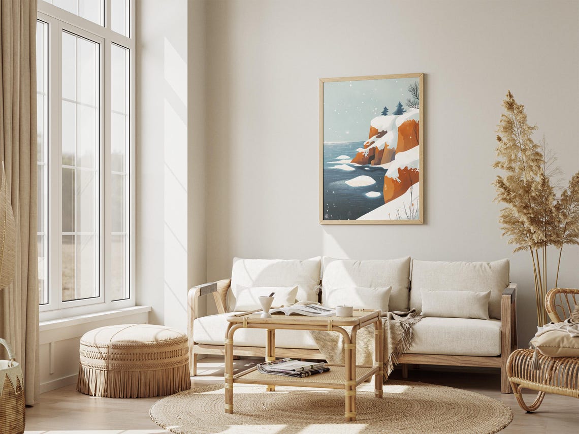 Snowy Orange Cliffs Along a Deep Blue Sea in Falling Snow Poster - Image 4