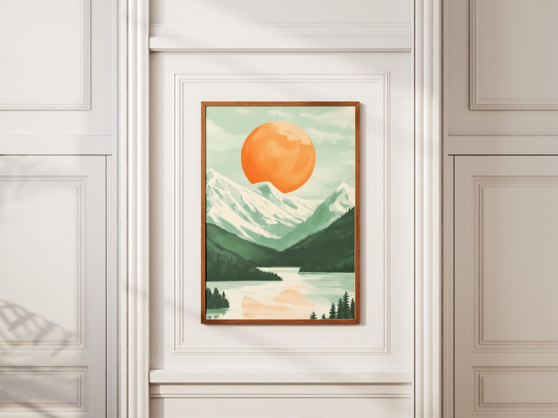 Huge Orange Sun Above a Green Snowy Mountain Lake Scene Poster - Image 2