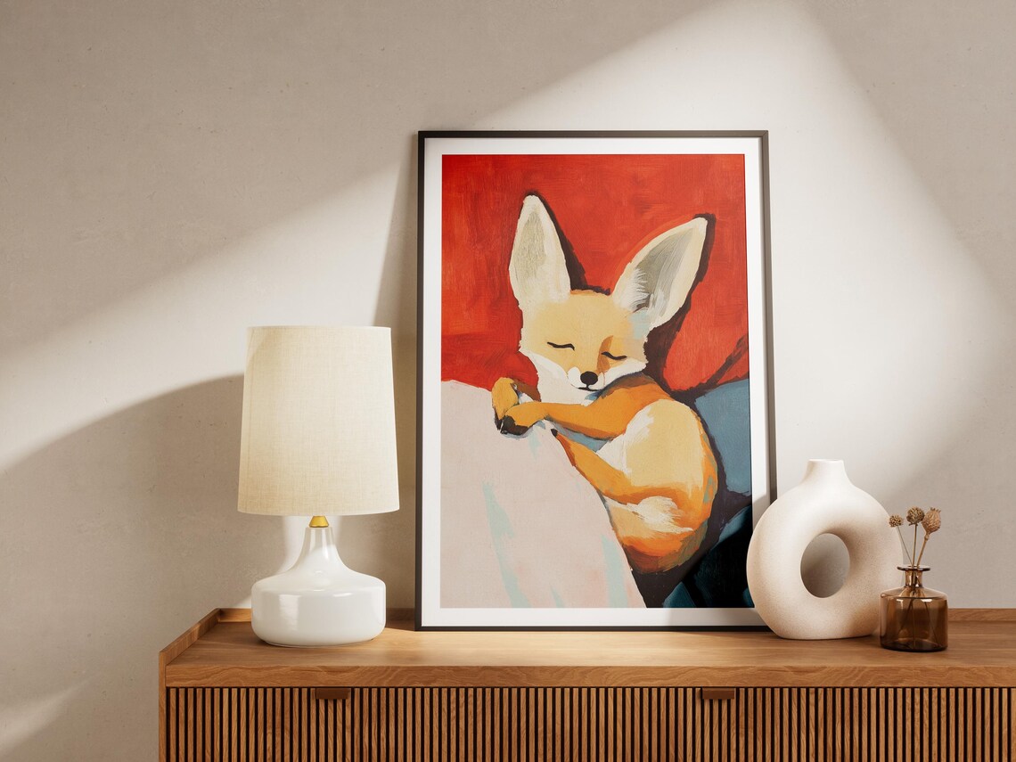 Fennec Fox Curled Up Sleeping on Cushions Against a Bold Red Art Poster - Image 4