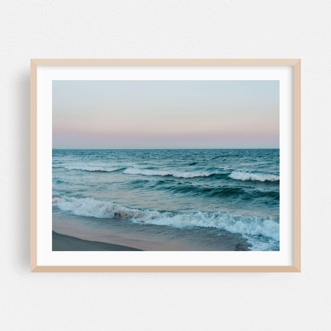 Pastel Ocean Waves Rolling Over Sandy Beach At Daybreak Poster