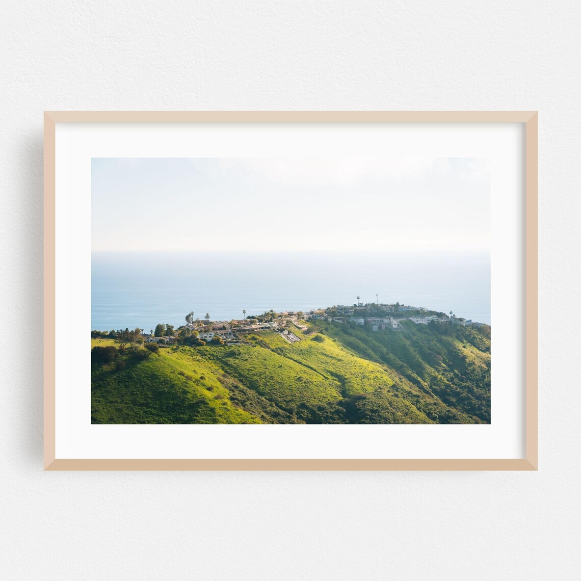 Seaside Town on Green Hills Overlooking the Ocean Photo Poster