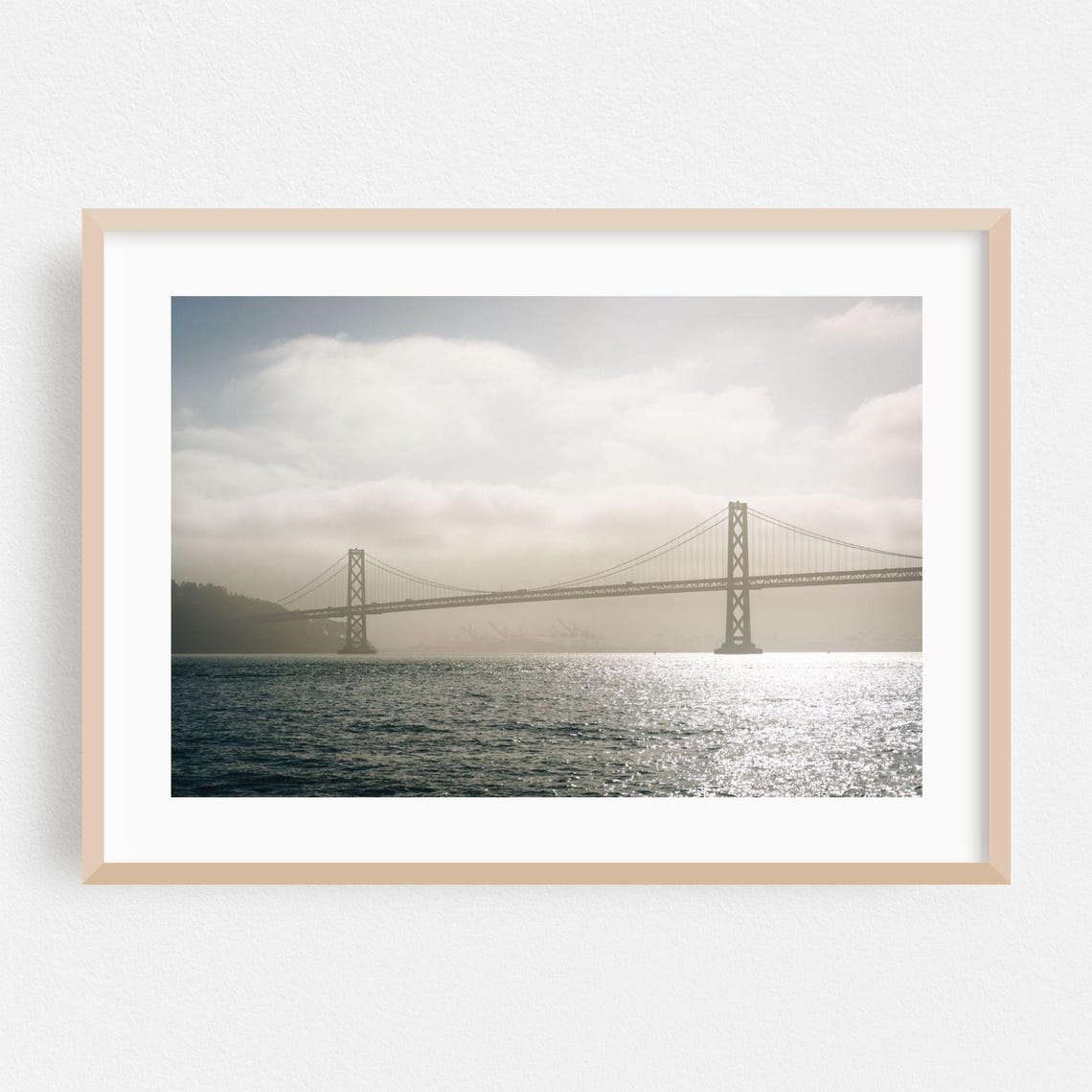 San Francisco Bay Bridge In Fog Over Sparkling Harbor Water Poster