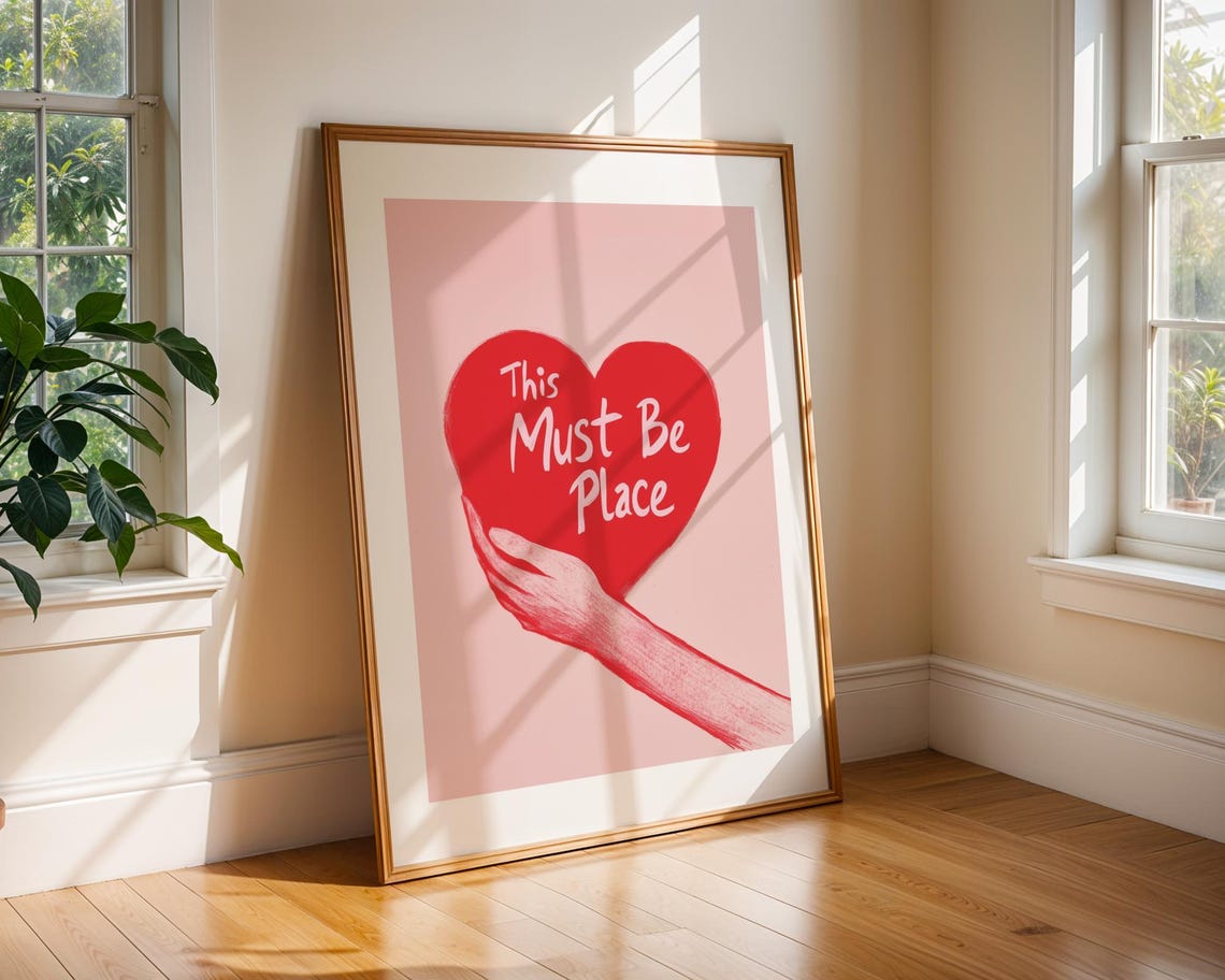 Hand Holding A Red Heart That Says This Must Be Place Poster - Image 3
