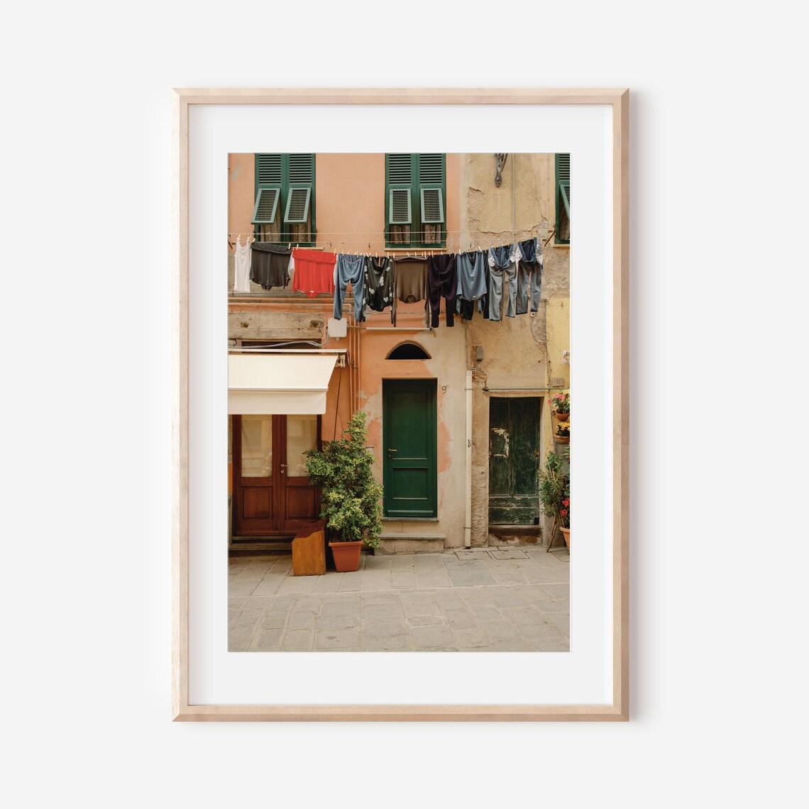 Sunny Italian Village Street With Laundry Lines and Shutters Poster