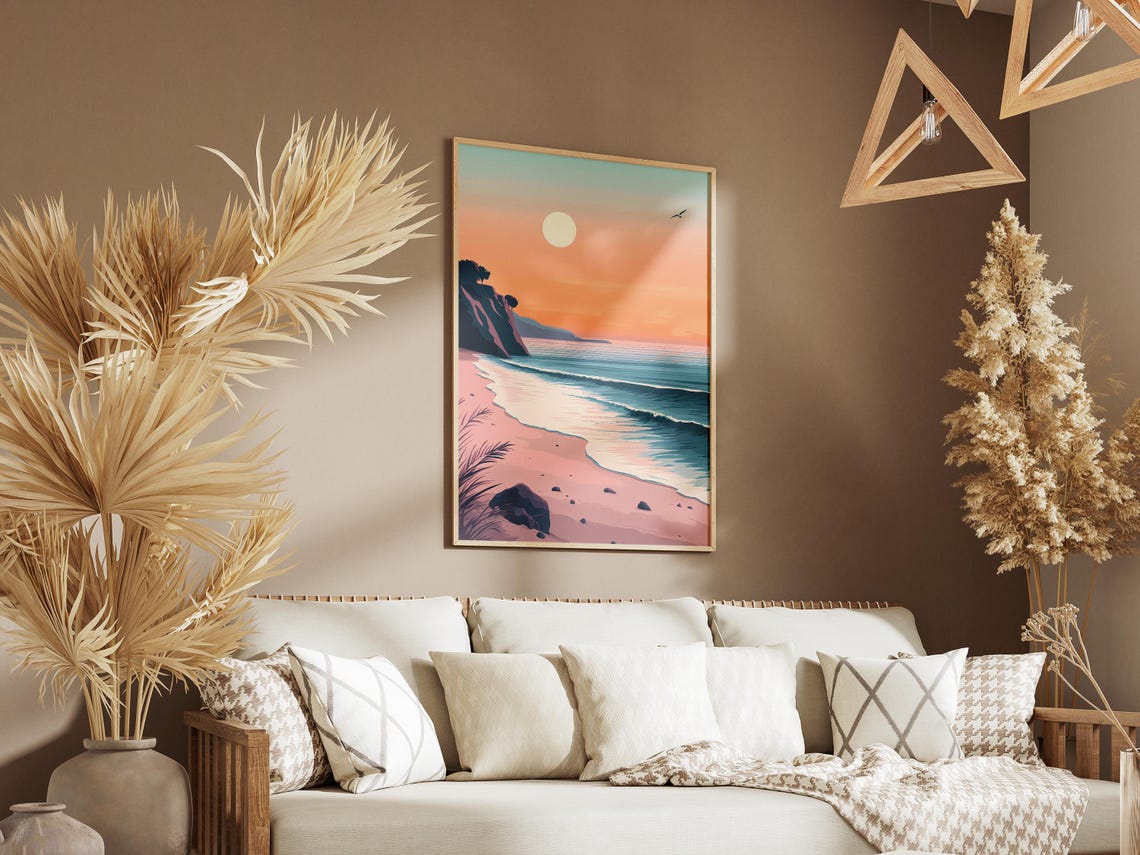 Soft Pink Sunrise Over a Curved Beach with Rocky Cliffs Poster - Image 3
