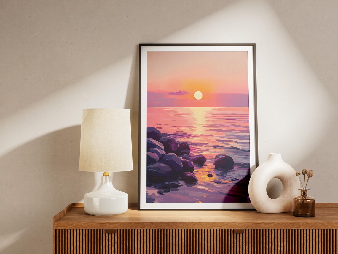 Pink and Purple Sunset Over a Rocky Shore and Calm Sea Poster - Image 5