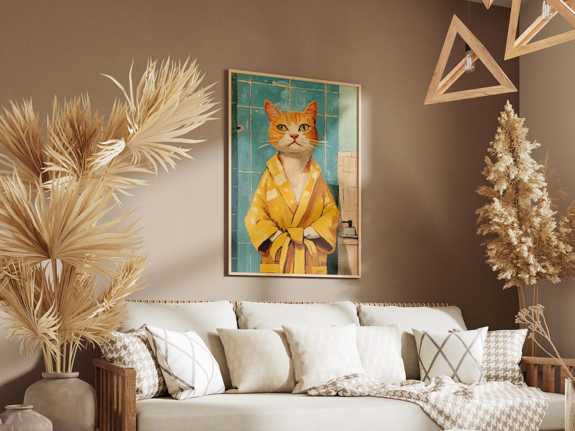 Confident Orange Tabby Cat Modeling a Sunny Yellow Bathrobe Poster - Image 3