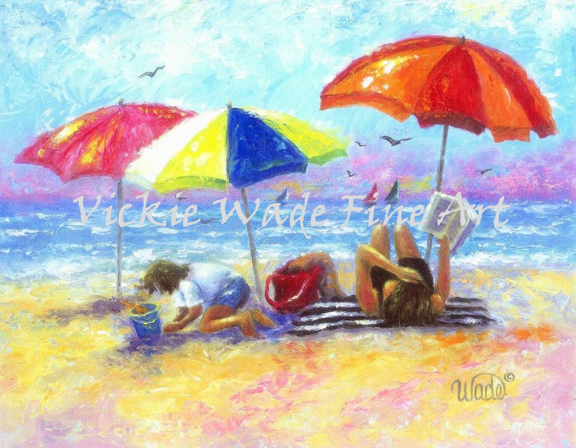 Mother Reading Under Umbrella While Child Plays On The Beach Poster