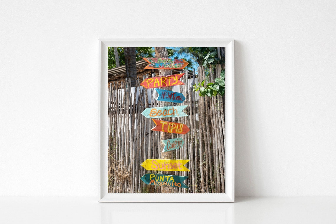 Colorful Hand Painted Wooden Direction Signs at a Beach Spot Poster - Image 2