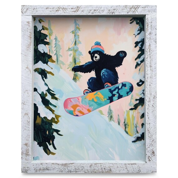 Black Bear Snowboarder Jumping Through a Snowy Forest Poster