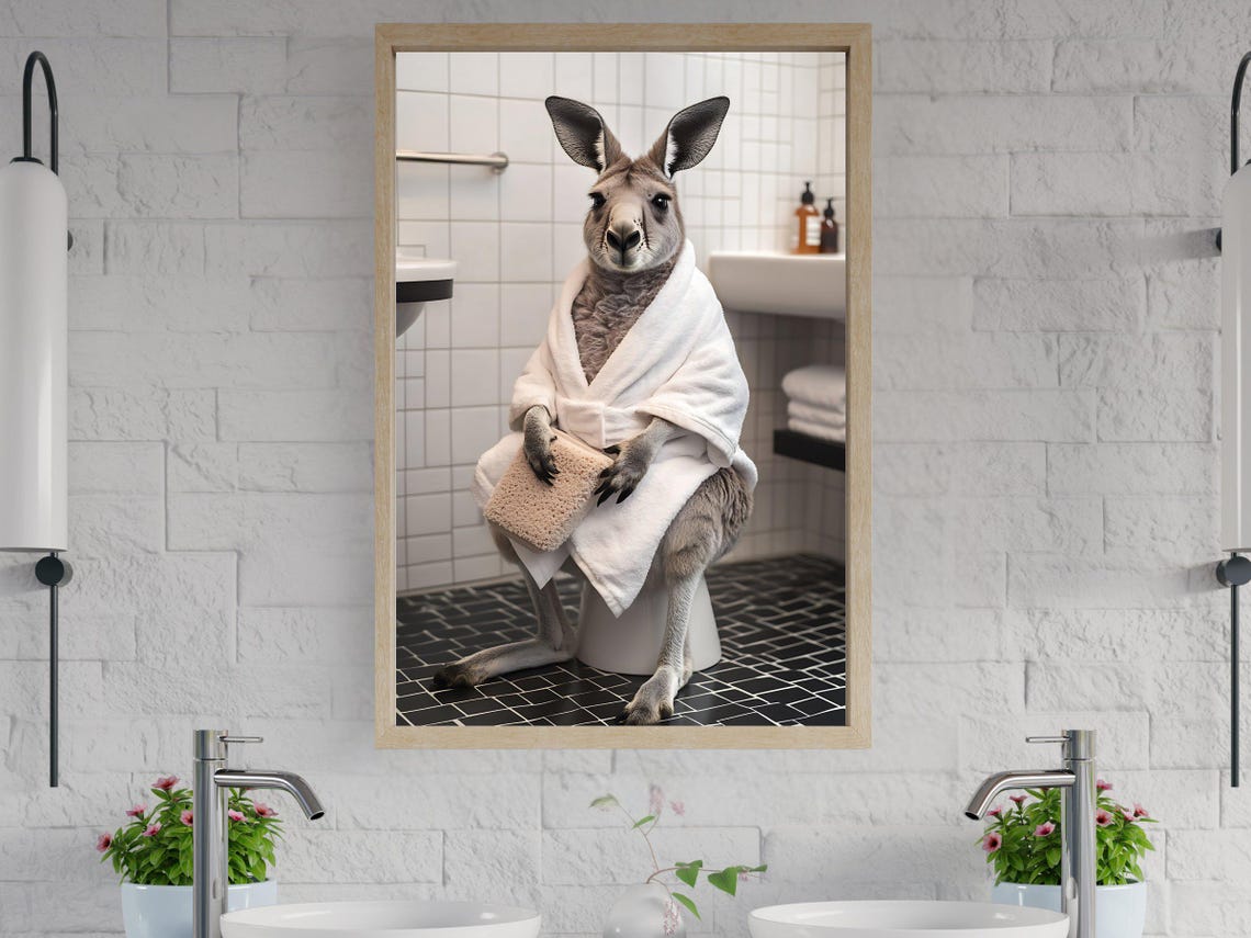 Kangaroo in a Bathrobe Sitting on a Toilet Holding a Sponge Poster