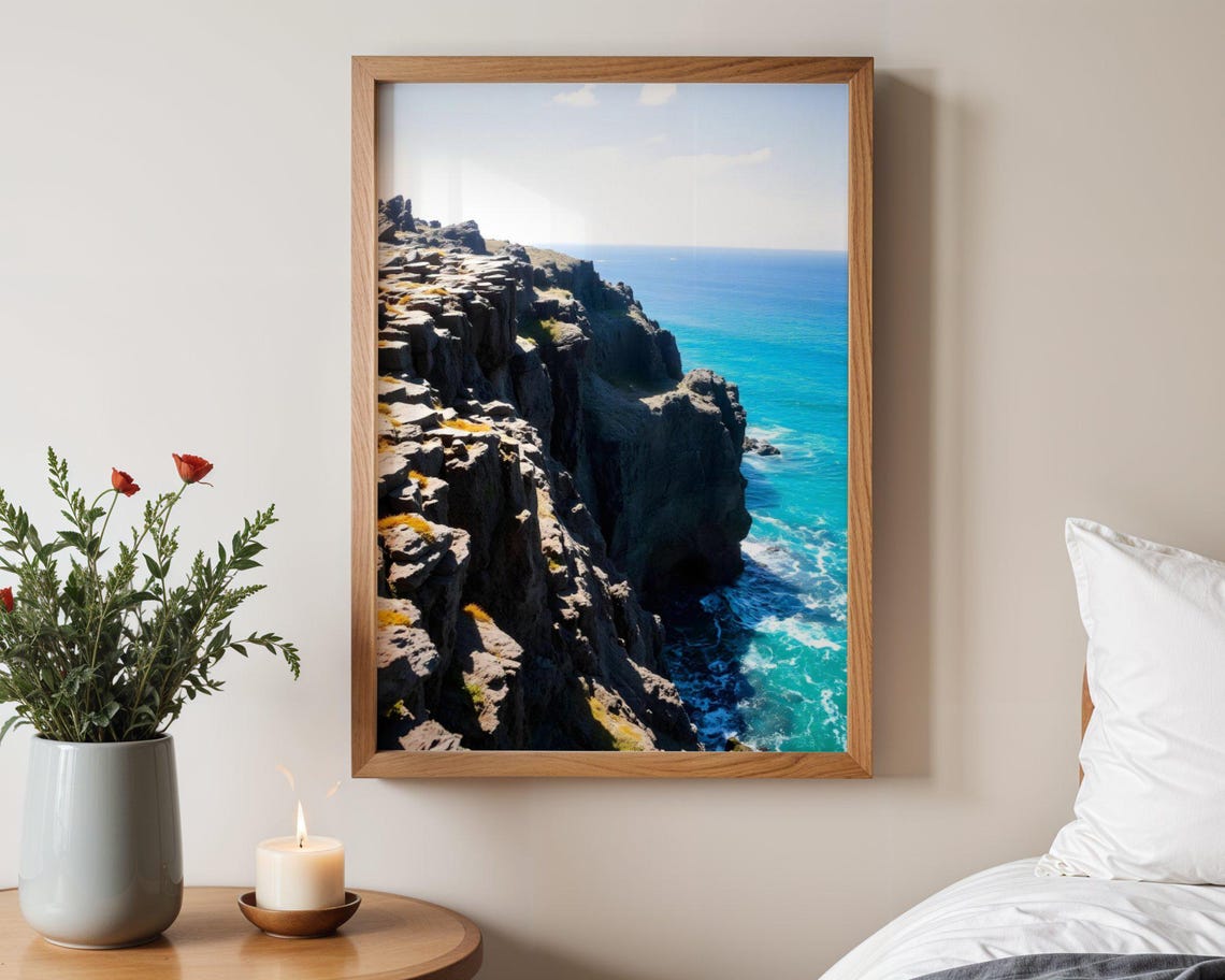 Dramatic Rocky Cliffs With Basalt Columns Above Deep Blue Ocean Poster