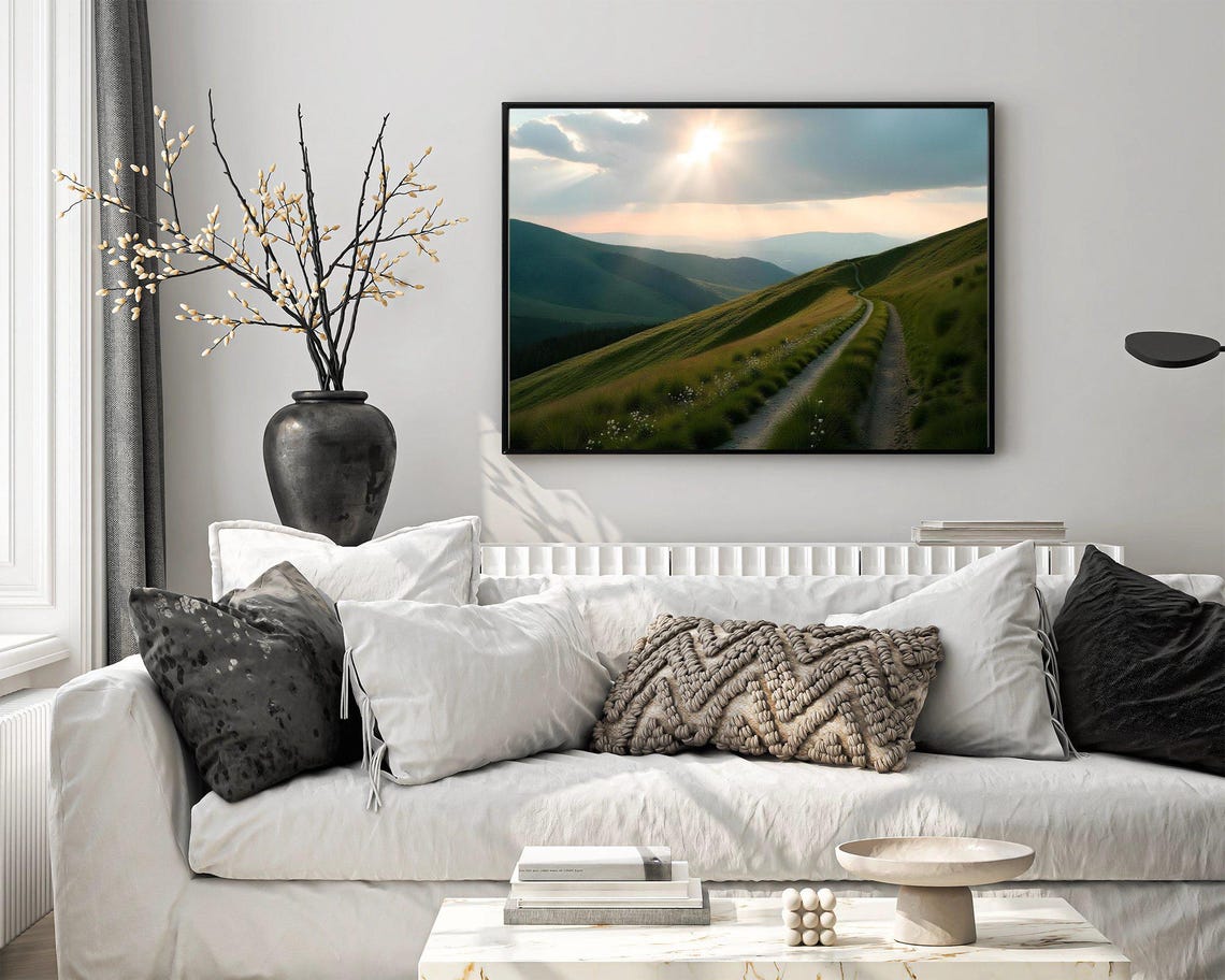 Winding Dirt Path Through Green Mountain Hills Under Sunbeams Poster - Image 4