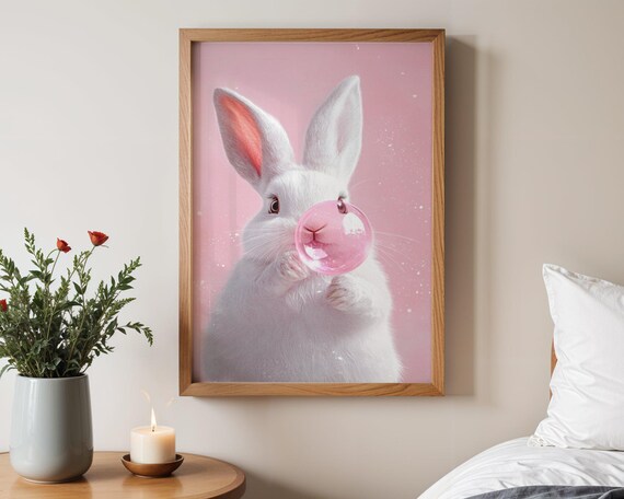 White Bunny Blowing A Pink Bubblegum Bubble On Pastel Pink Poster