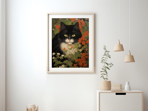 Black and White Tuxedo Cat Among Bright Red Garden Flowers Poster