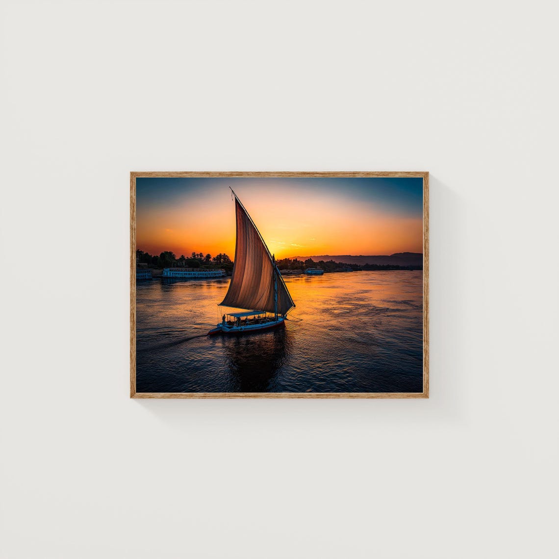 Traditional Felucca Sailboat Gliding at Sunset on the Nile Poster
