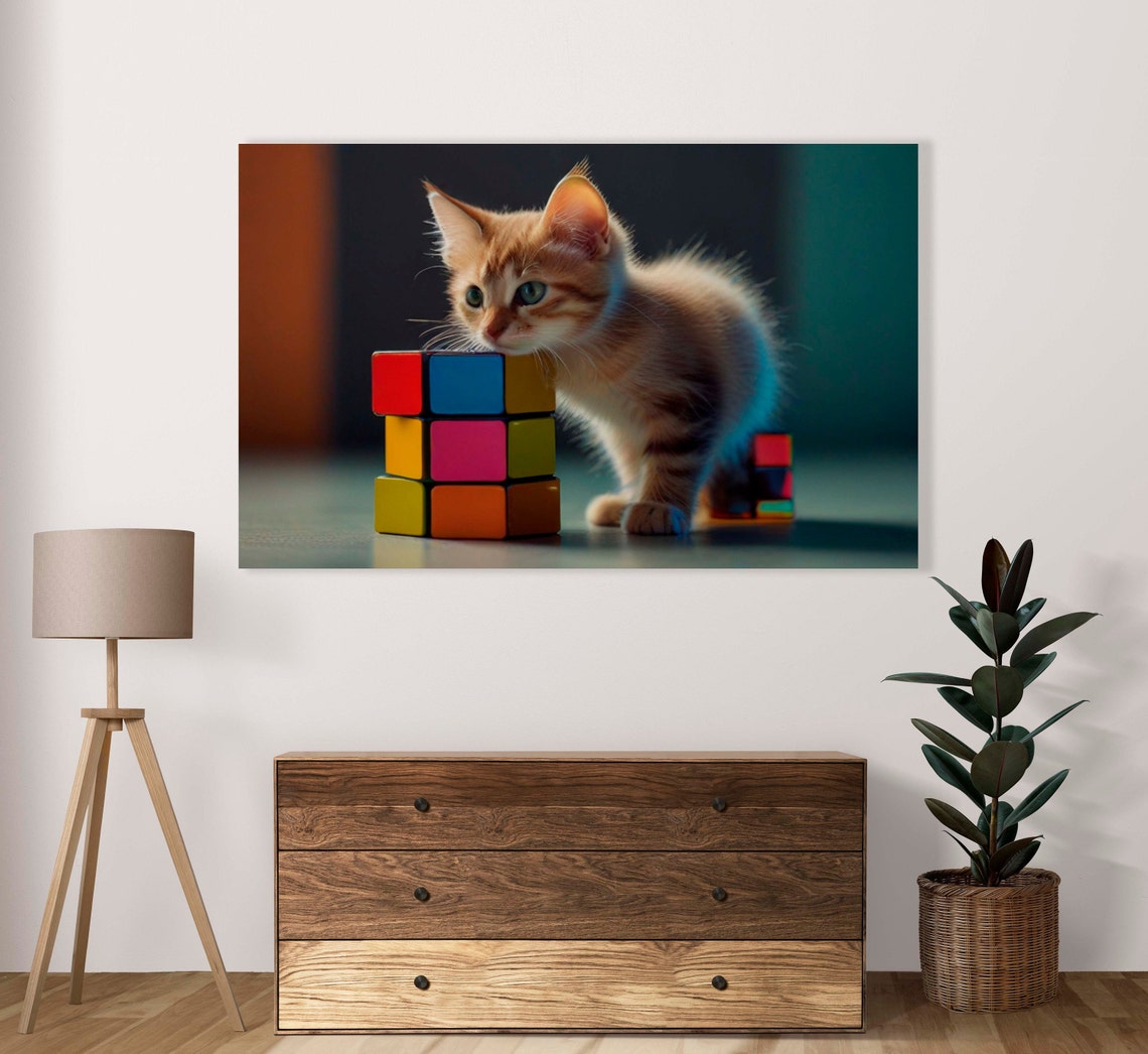 Adorable Orange Tabby Kitten Playing with Colorful Cubes Poster