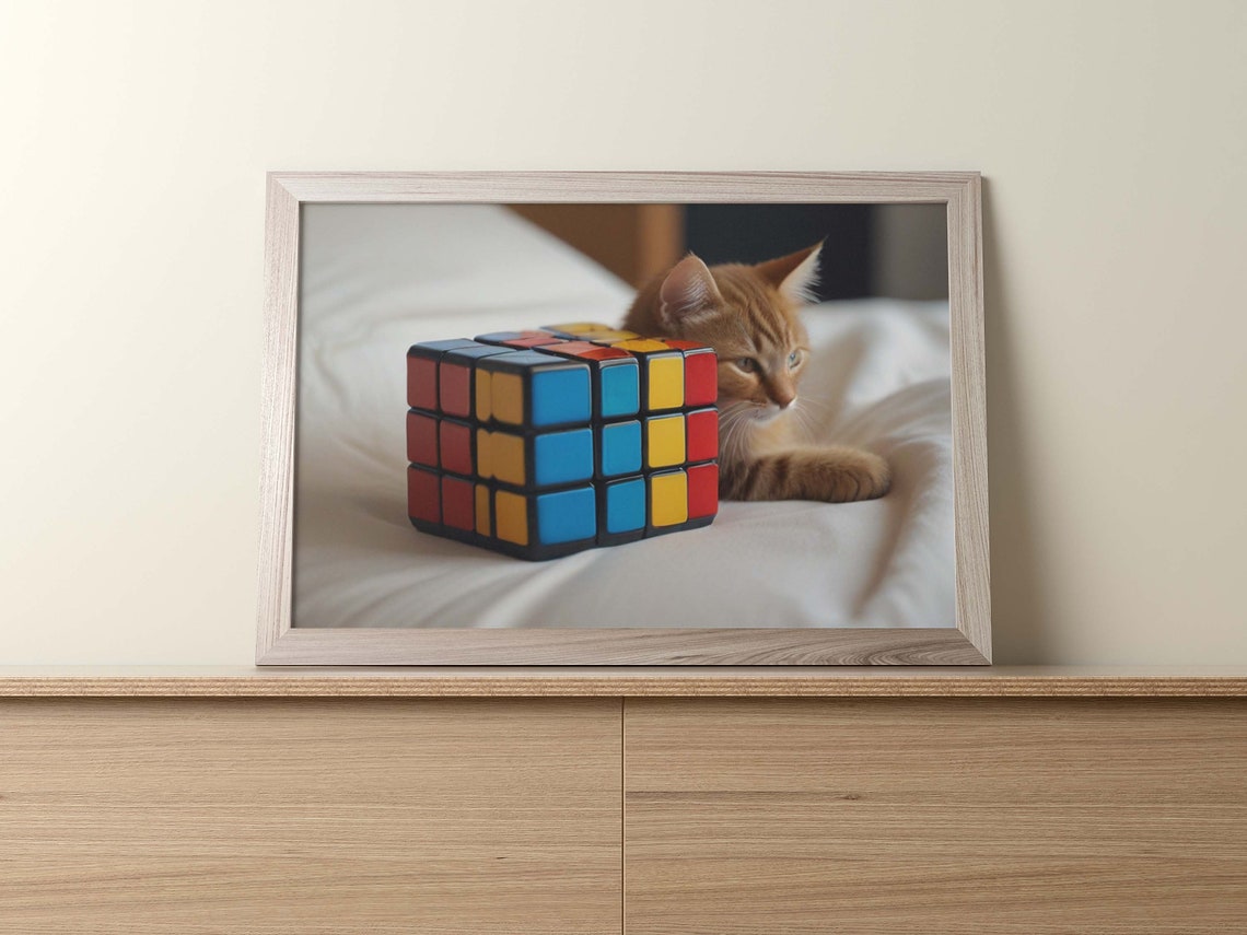 Orange Tabby Kitten Resting Its Head On 3x3 Rubiks Cube Poster - Image 2