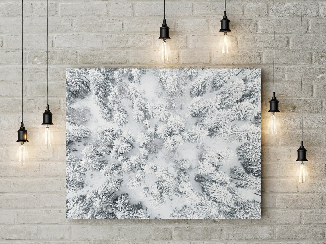 Aerial Drone View Over a Snow Covered Forest in Winter Poster - Image 2