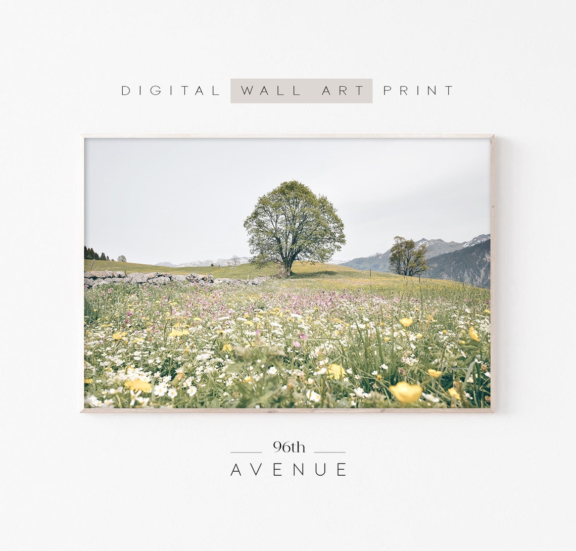 Sunlit Wildflower Meadow with Lone Tree Mountain Backdrop Poster