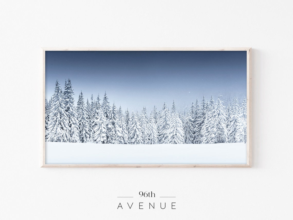 Snow Laden Pine Forest Panorama Under Pale Blue Winter Sky Poster