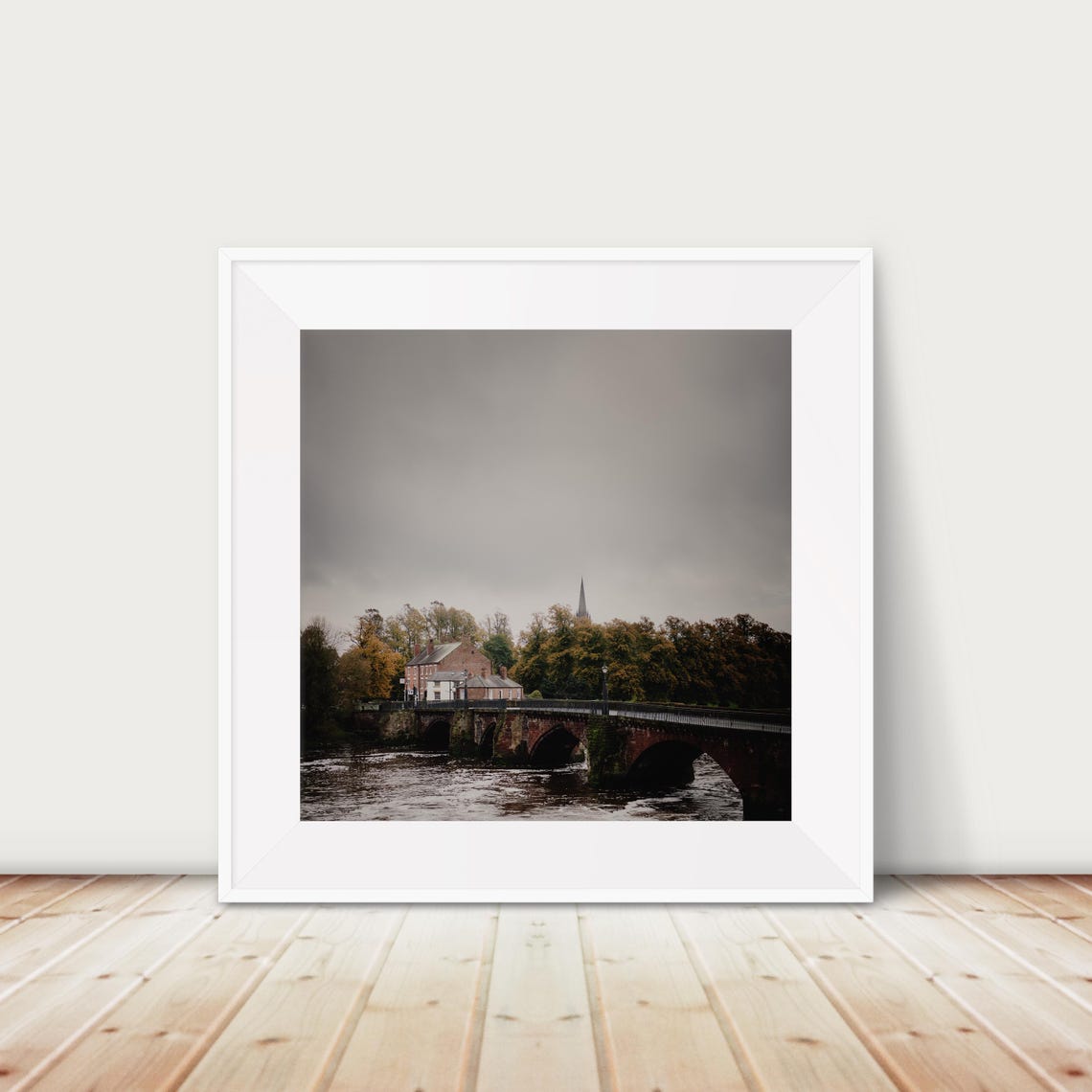 Historic Stone Arch Bridge Over a River on a Cloudy Day Poster