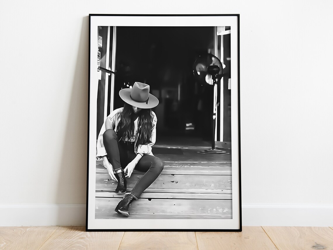 Cowgirl in Hat Sitting on Porch Steps Black and White Photo Poster - Image 4