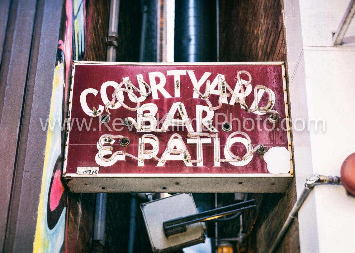Courtyard Bar And Patio Neon Sign Black And White Photo Print - Image 2