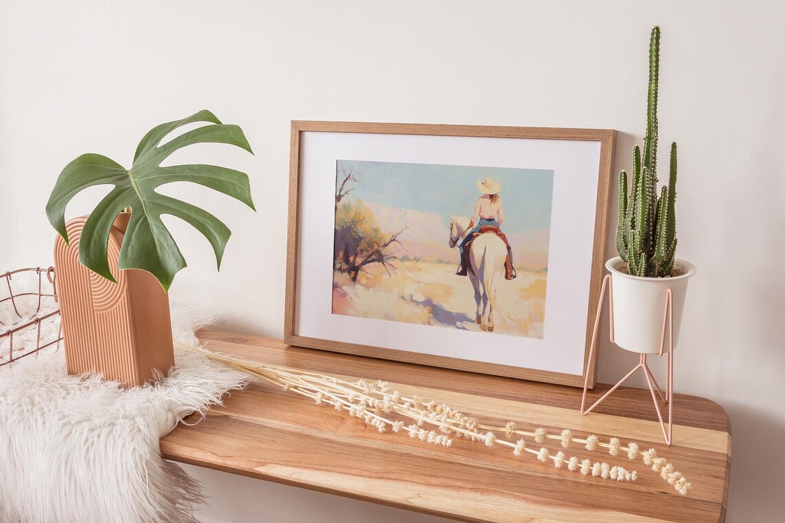 Cowgirl Riding a White Horse Into a Desert Canyon Western Art Poster - Image 2