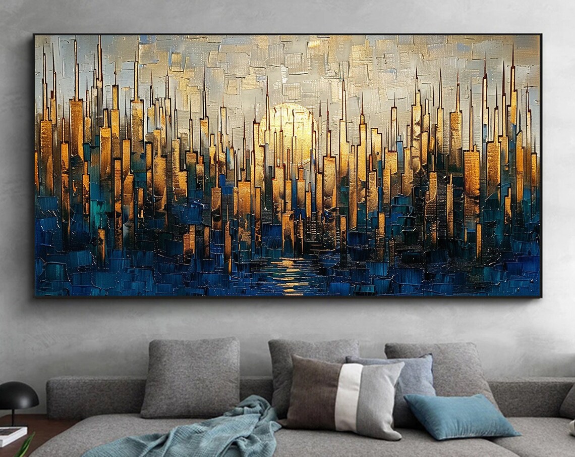 Golden City Towers at Dusk with Blue Water Reflection Poster