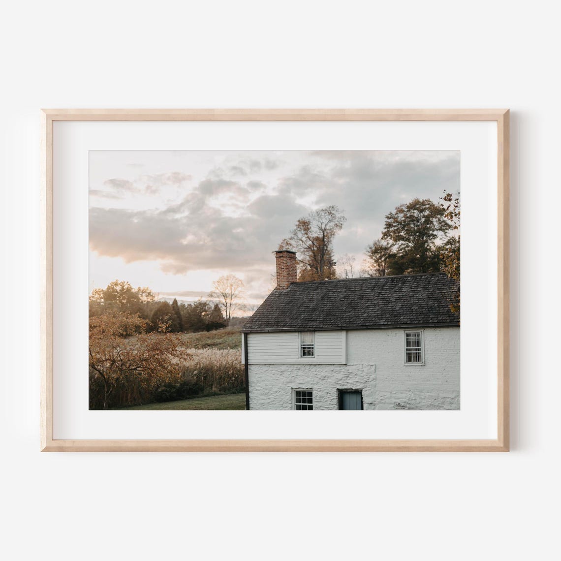 White Farmhouse Glowing in a Golden Sunset Countryside Sky Poster