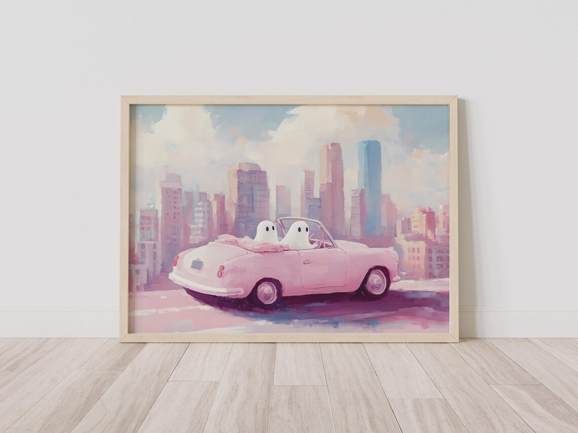 Two Cute Ghosts Riding A Pink Vintage Convertible In The City Poster - Image 2