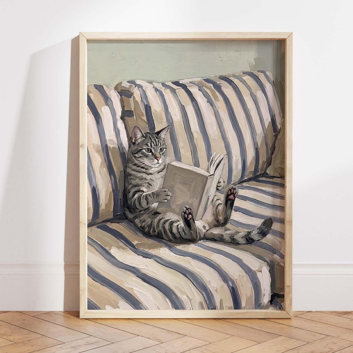 Cute Tabby Cat Reading a Book on a Striped Sofa Painterly Poster