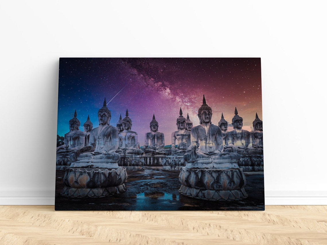 Stone Buddha Statues Under a Starry Milky Way Night Sky Poster