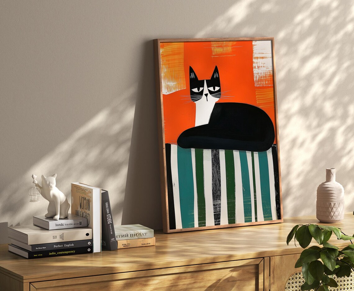 Bold Black And White Cat On Striped Fabric With Orange Poster - Image 3