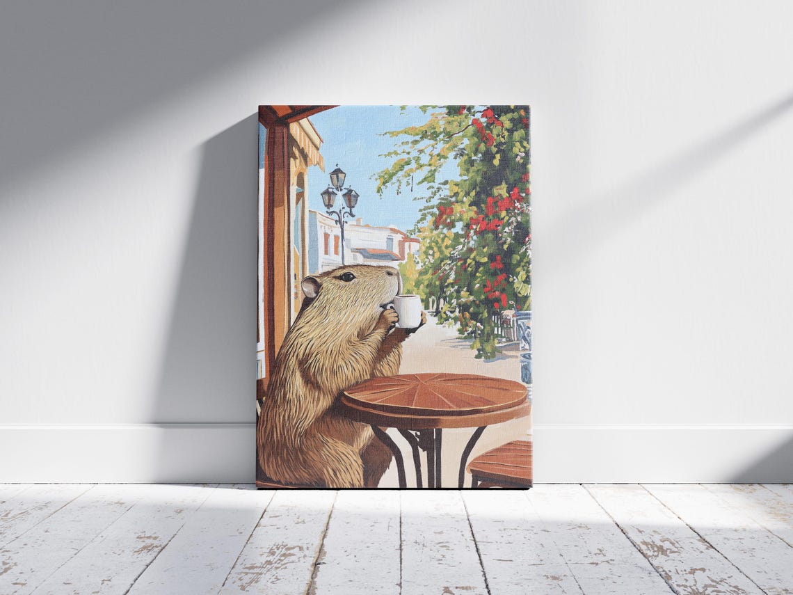 Capybara Drinking from a Mug at a Flower Lined Street Cafe Poster - Image 2