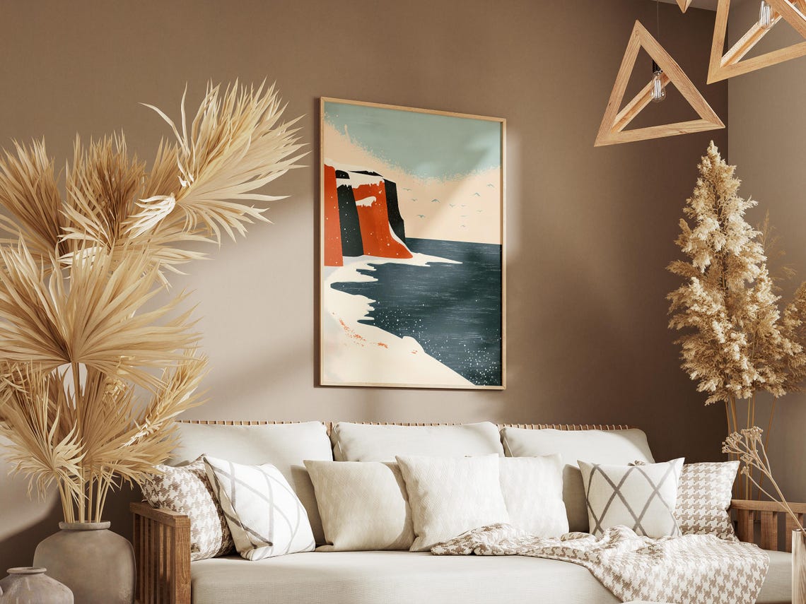 Snowy Orange Cliffs Above a Dark Winter Sea Minimalist Poster - Image 3