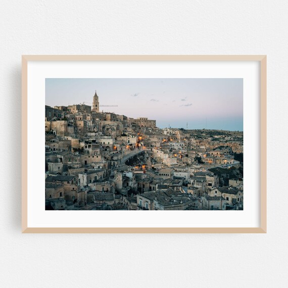 Matera Italy Ancient Stone Town at Dusk with Glowing Windows Poster