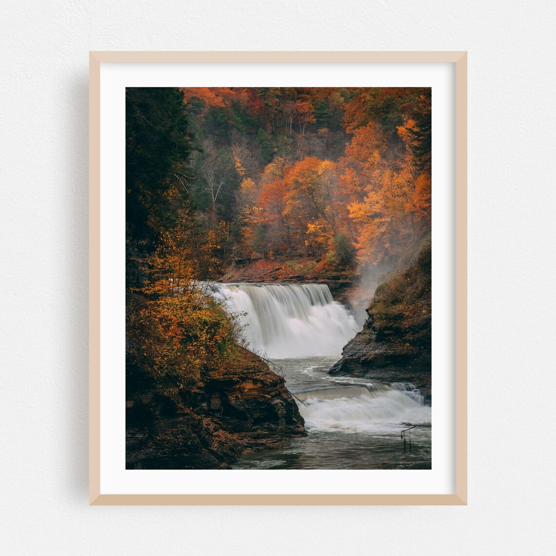 Autumn Waterfall Cascading Through Fiery Orange Forest Landscape Poster