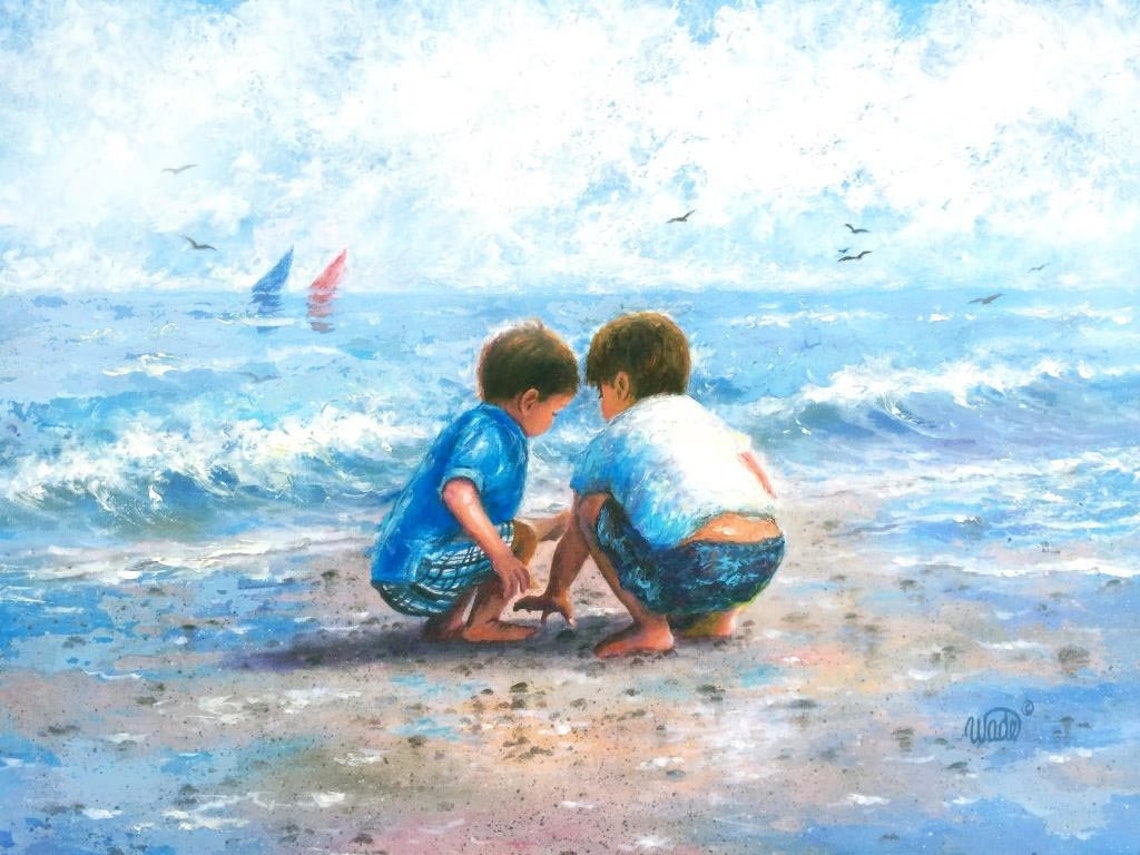 Two Boys Crouching And Playing In The Sand At The Ocean Edge Poster