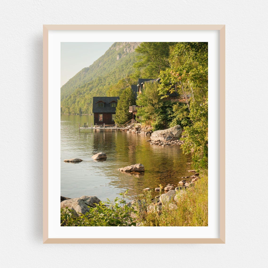 Lakeside Cabin Beneath Forested Mountain At Golden Hour Poster