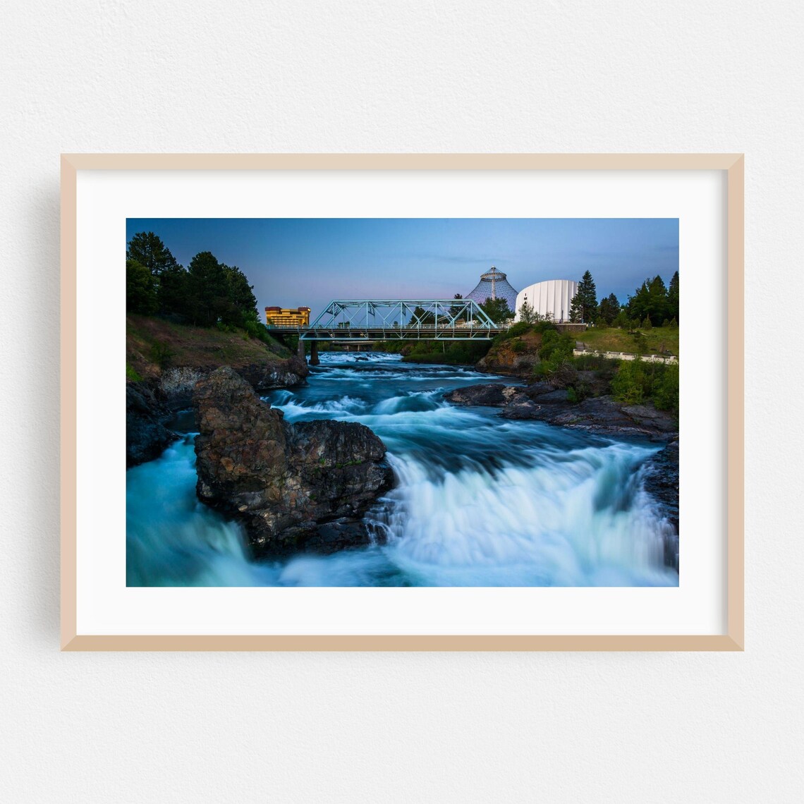 Majestic Spokane Falls Rushing Beneath a Steel Bridge at Dusk Poster