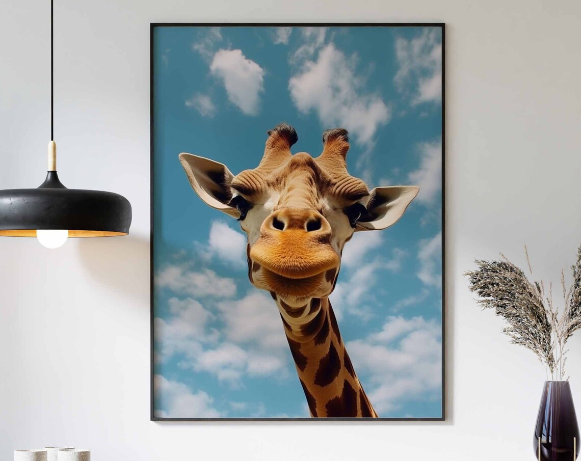Giraffe Face Close Up Against a Blue Sky with Fluffy Clouds Poster
