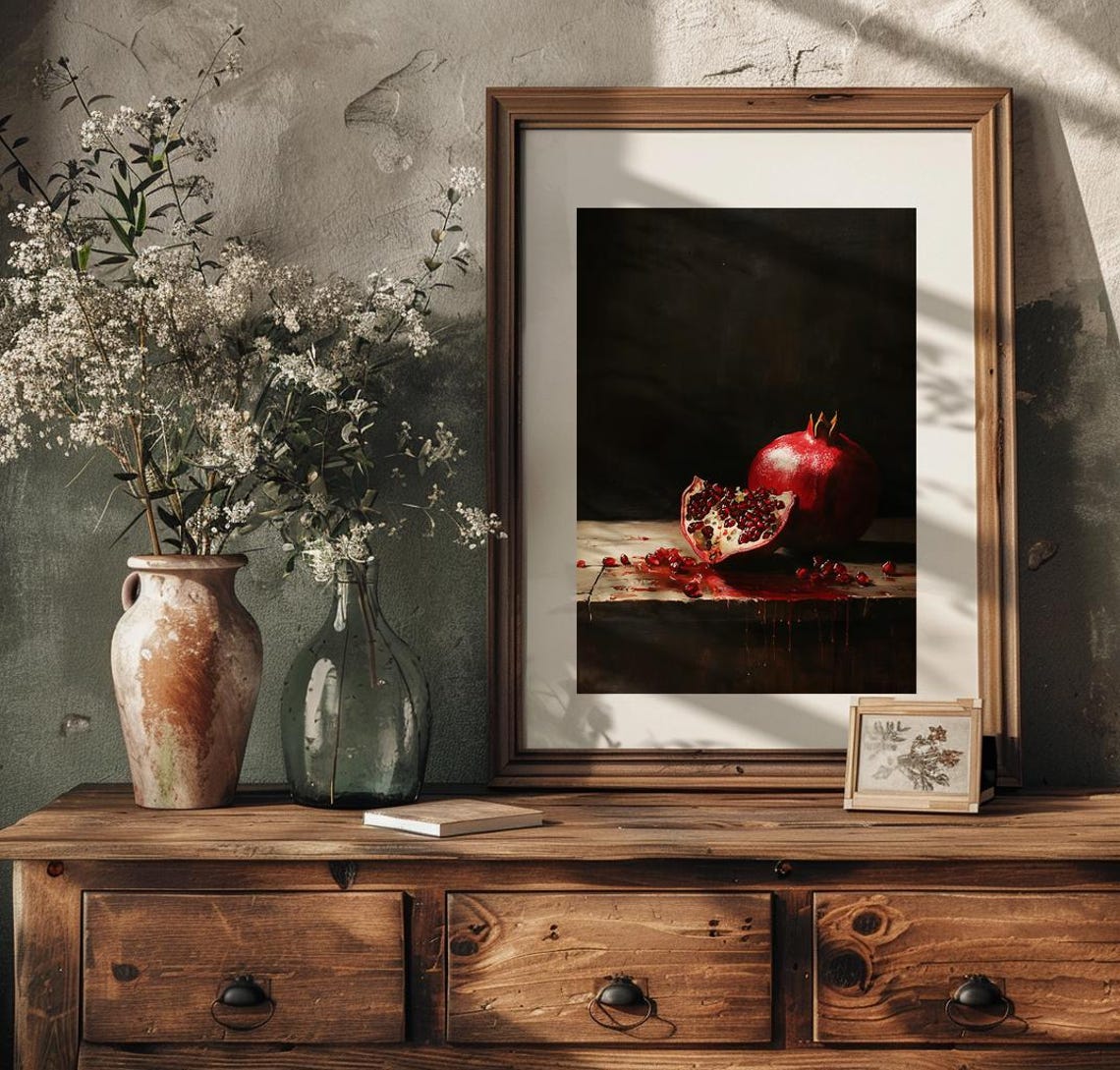Whole Pomegranate with Dripping Juice on a Dark Wooden Table Poster - Image 3