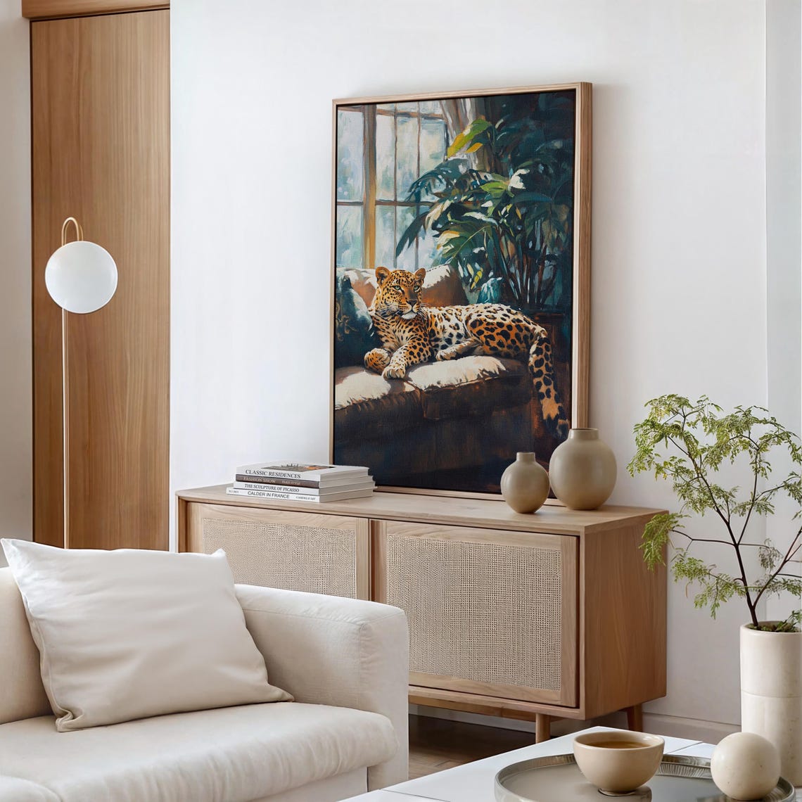 Relaxed Leopard Lounging on a Sunlit Sofa Beside Palm Plants Poster - Image 5