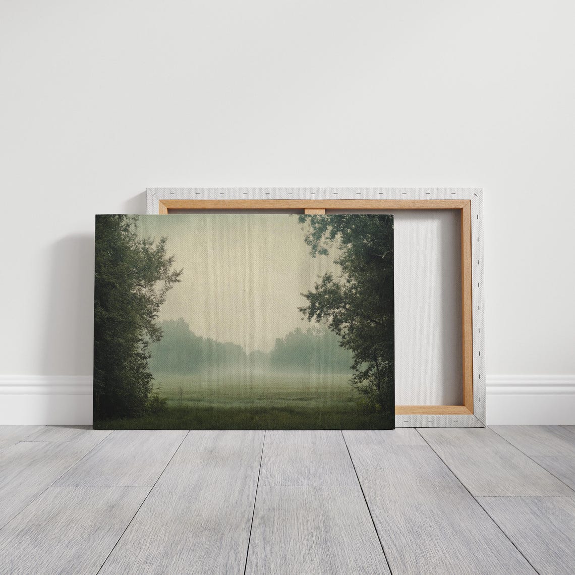 Sunbeam Breaking Through Fog Over Green Meadow Framed By Trees Poster - Image 3