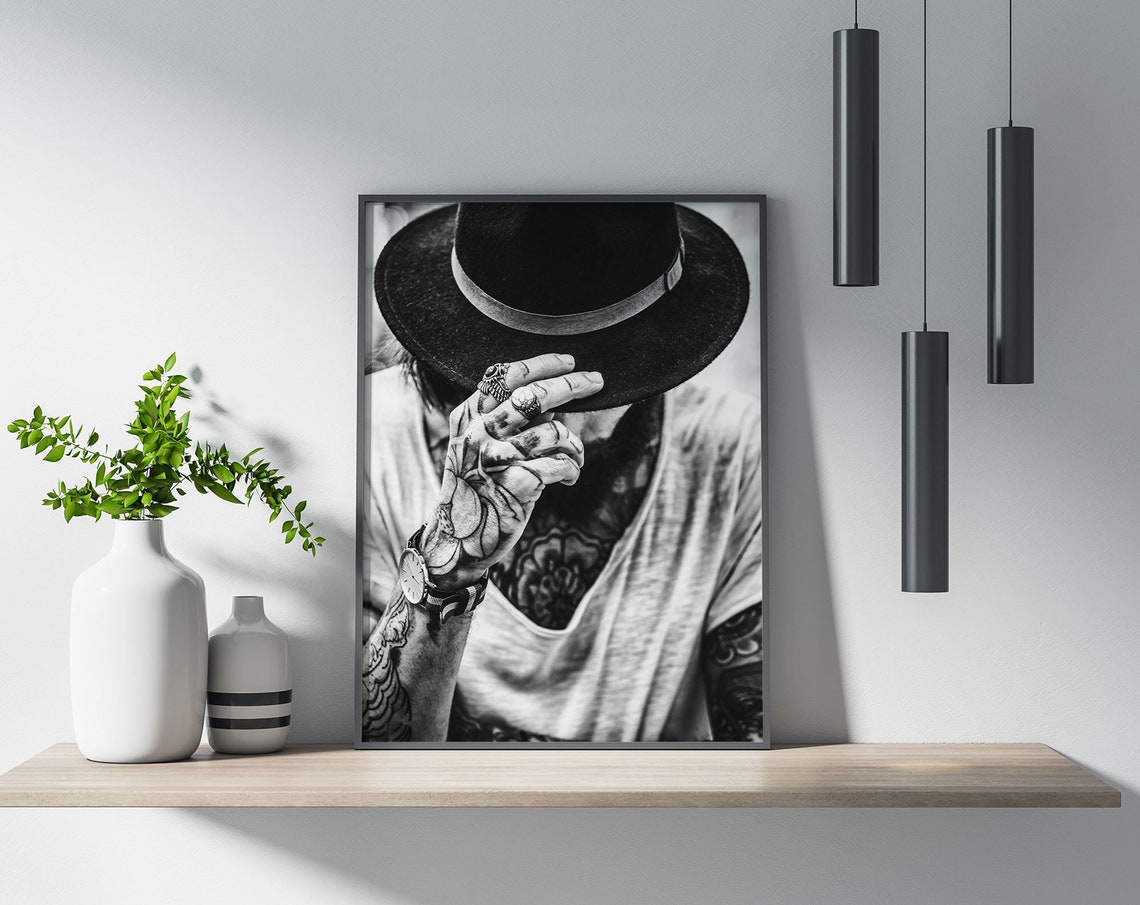 Tattooed Man Tipping Hat Black and White Moody Portrait Poster