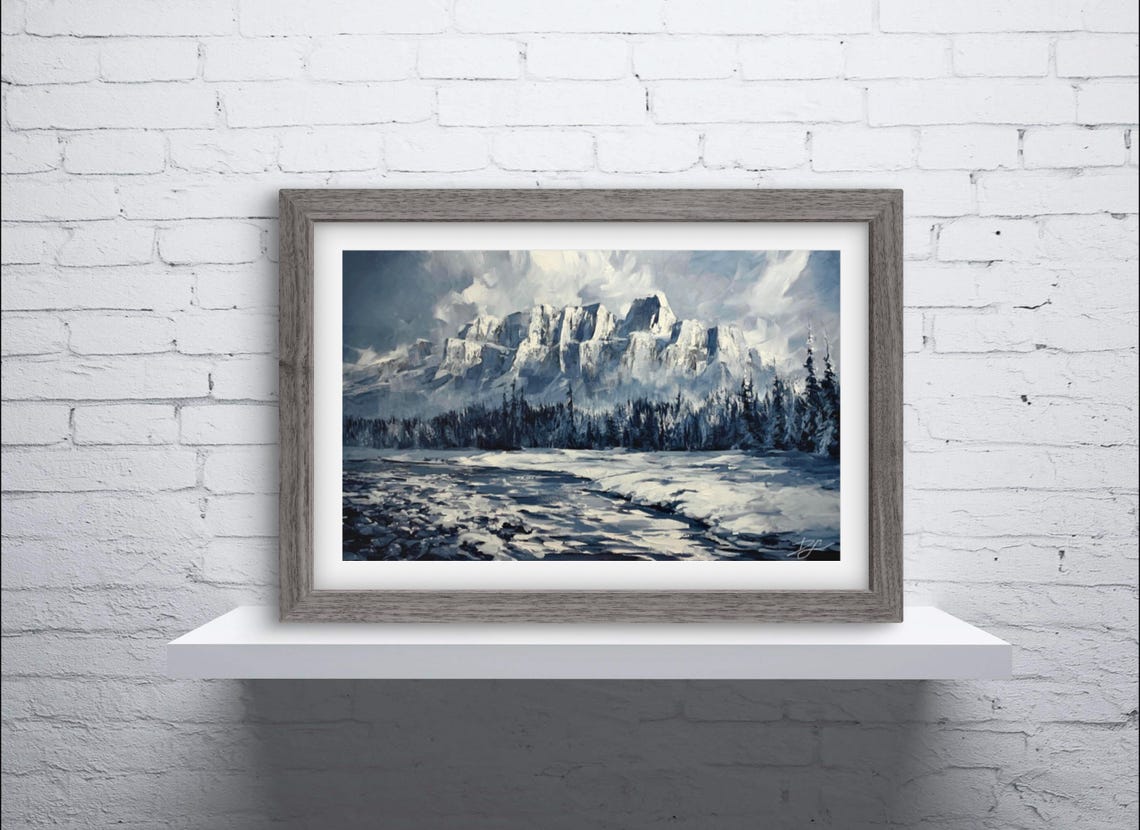 Banff Snowy Mountain Range With Frozen Lake Under Winter Clouds Poster